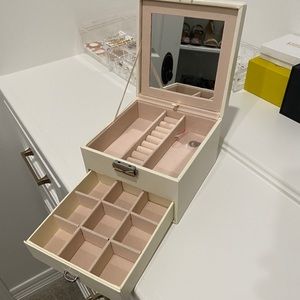 Small cream colored jewelry box